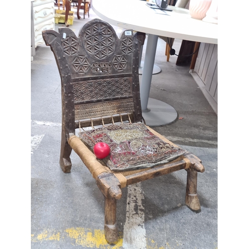 502 - Stat Lot : The chair was purchased from an exhibition of Tibetan furniture in new York. its from the... 