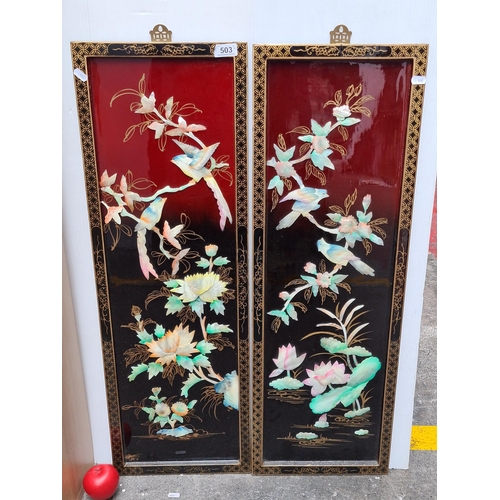 503 - Two beautiful Asian wall plaques which feature bird and floral detail in high relief, hand carved an... 