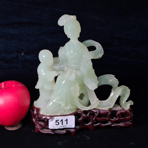 511 - Star Lot : A very finely carved pale jade sculpture mounted onto a wooden plinth base. Incredible ar... 