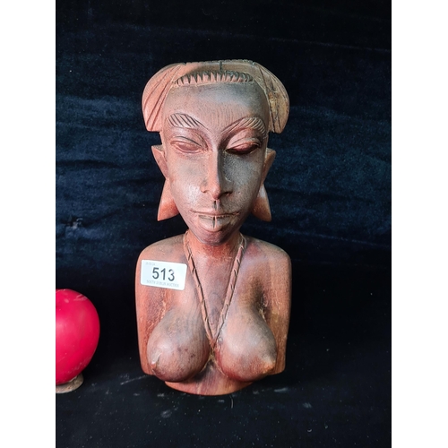 513 - A vintage exotic wood sculpture of an African female bust with fine handwork. In very good condition... 