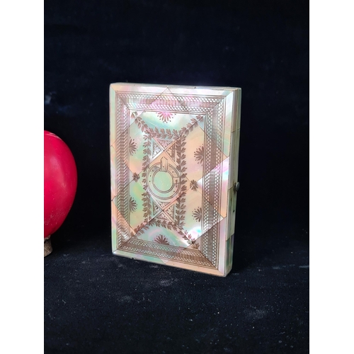 519 - A truly stunning 19th century Victorian Mother of Pearl card case with blue interior. In excellent c... 