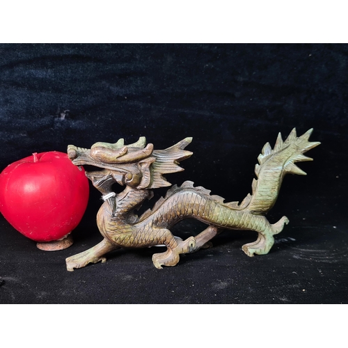 520 - Star Lot : A fabulous example of an antique hand carved soapstone dragon sculpture.