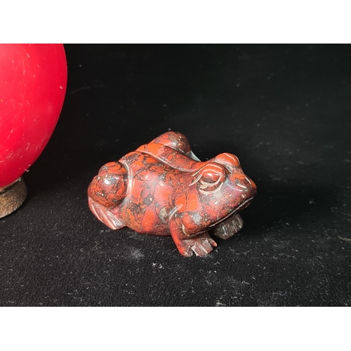 535 - A very sweet example of carved red jasper stone miniature frog figure.