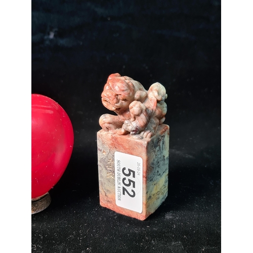 552 - A Chinese Soapstone seal with a Lion and cub to top. Features handle carved as a lion and cub, emble... 