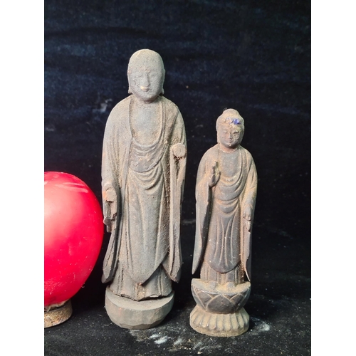 564 - Star Lot : A pair of very early 17th century smaller standing wooden figures of the Amida Buddha. Th... 