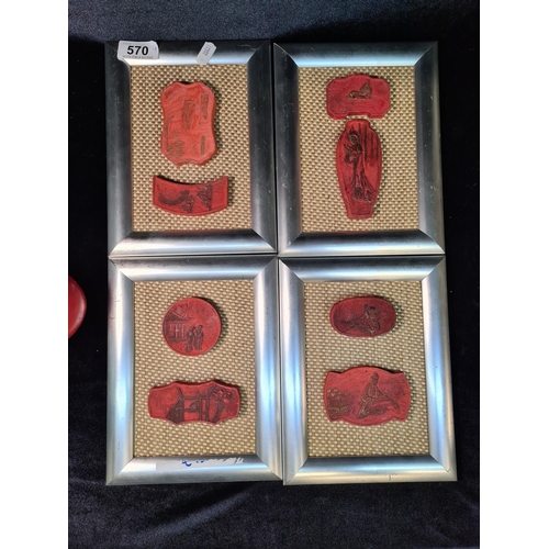 570 - A collection of four Chinese Ming Dynasty ink seals mounted on a woven backdrop and framed in a wood... 