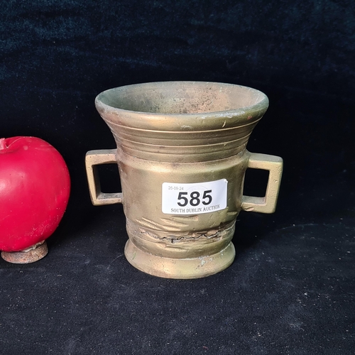 585 - A very heavy antique Chinese solid brass mortar.