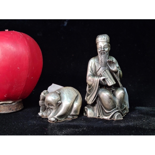 605 - Two miniature Chinese pewter figures depicting two wish old gentlemen.