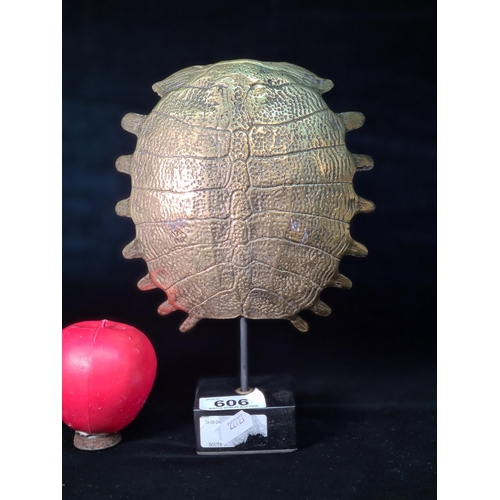 606 - Star Lot : An elegant polished bronze, organic, freestanding sculpture in the form of a turtle shell... 