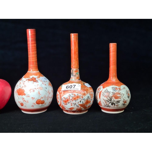 607 - Three 19th century graduating hand painted beautiful Kutani bottles. Features delicately detailed fl... 