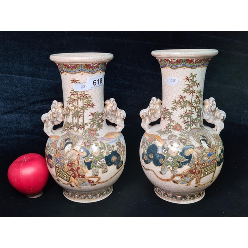 618 - Star lot : A pair of beautiful antique twin handle crackled Satsuma vases. Highly decorated with lov... 