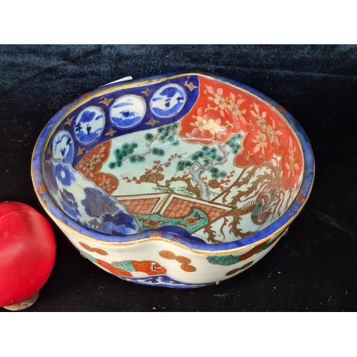 624 - Star Lot : An incredible example of an antique Japanese Imari bowl featuring the classic orange, blu... 