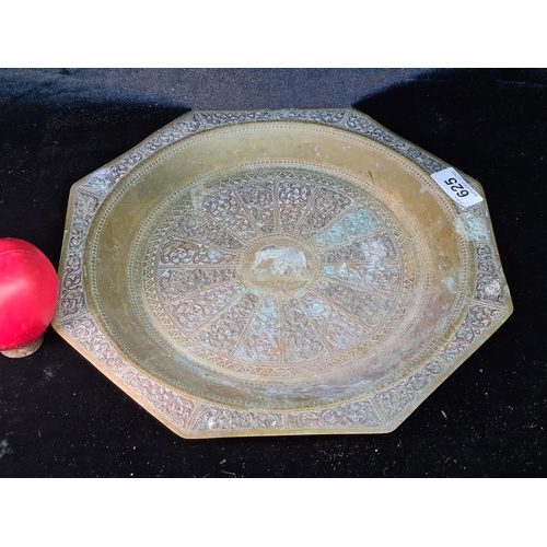 625 - A gorgeous large Indian hand engraved octagonal brass plate with elephant motif to centre. Lovely de... 