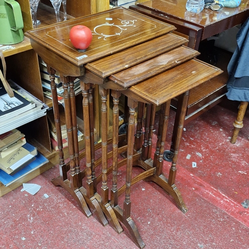 632 - Star Lot : A superb set of four nesting tables boasting beautiful mother of pearl inlay to table sur... 