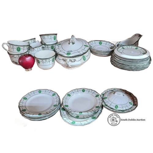 1028 - Royal Doulton Countess dinnerware set features a green and white pattern. Includes plates, cups, sau... 