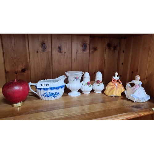 1031 - Set of ceramic collectibles includes a German blue and white jug, a floral vase, salt and pepper sha... 