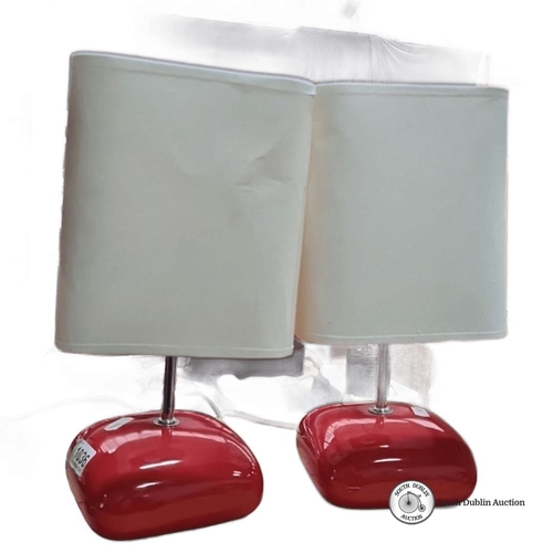 1036 - Star Lot :A Pair of mid century modern ceramic table lamps with red bases and white rectangular fabr... 