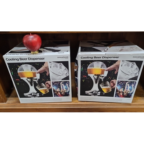 1048 - Set of two boxed items, each containing a beer dispenser designed to keep beverages chilled.