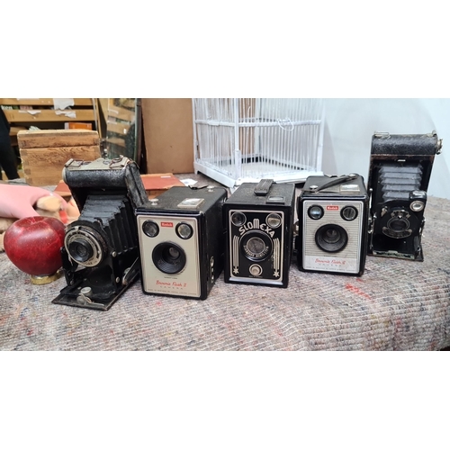 1060 - Collection of five vintage cameras including Kodak Brownie Flash II, Slomexa Standard Men's Ting, Ko... 