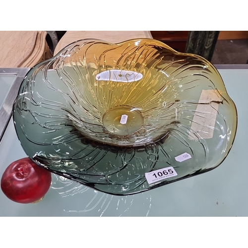 1065 - A large Hand-blown leaded art glass bowl with vine stem pattern.