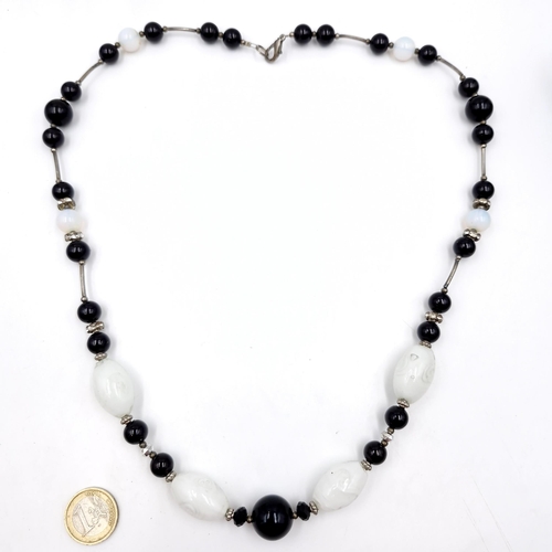 1006 - A nice chunky onyx and Jett  beaded necklace. Total length 72cm. Stones cold to the touch.