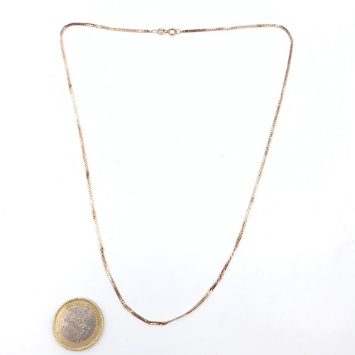 1000 - A stunning nine carat gold dainty chain necklace. Stamped 375 to chain. Housed in a black velvet jew... 