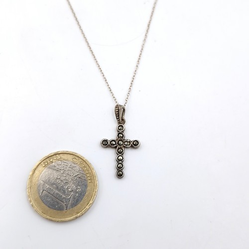 999 - A continental silver necklace with marcasite cross pendant. Stamped 835 to chain. Total weight 2.73 ... 