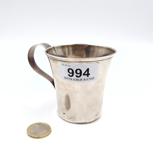 994 - A sterling silver antique cup with handle. Weight 88.07 grams. With hallmarks to base.