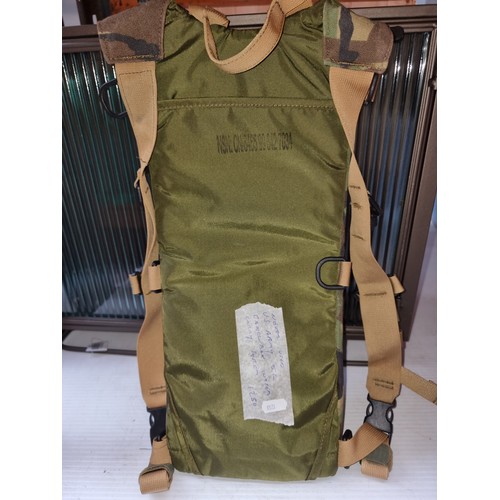 292 - An interesting camo US Army 5L camel back maximum gear, water carry system.