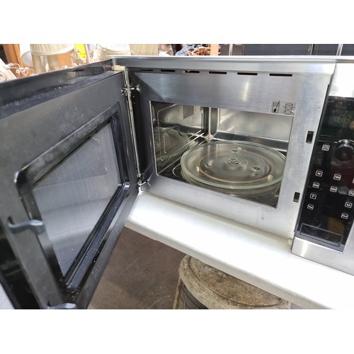 317 - Star Lot : A NEFF integrated kitchen microwave oven. Model no. H11WE60N0G. Similar models RRP: £400 ... 