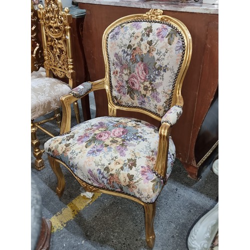 375 - Star Lot : A beautiful and very elegant elbow chair upholstered with a floral tapestry and featuring... 