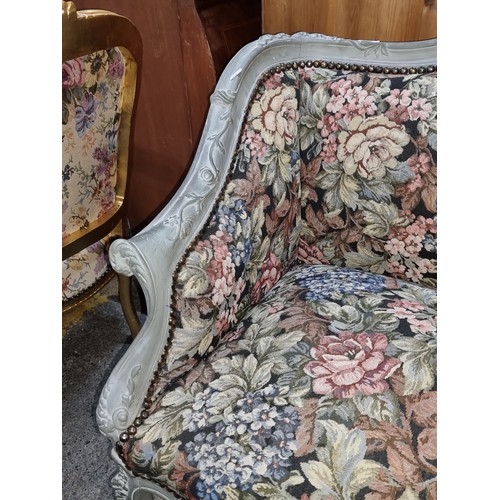 376 - Star Lot : A fantastic French style two seater sofa, painted in a rustic grey tone and upholstered w... 