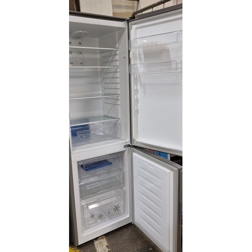 390 - A ZANUSSI frost free fridge freezer with brushed stainless steel finish. Model no.ZRM23200XA  RRP £3... 