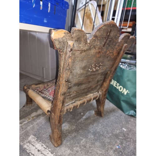 502 - Stat Lot : The chair was purchased from an exhibition of Tibetan furniture in new York. its from the... 