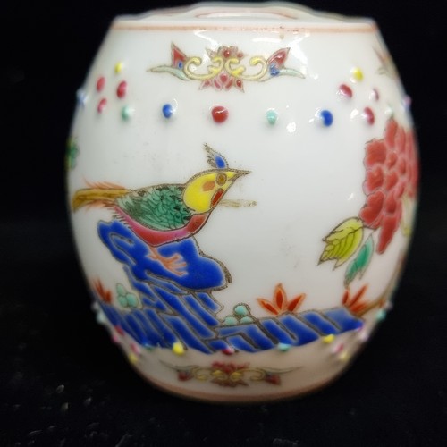 531 - A lovely pair of miniature Chinese hand painted famille rose porcelain lidded jars. Both stamped to ... 