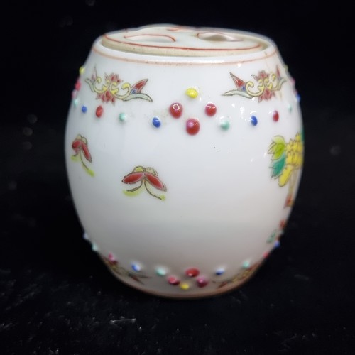 531 - A lovely pair of miniature Chinese hand painted famille rose porcelain lidded jars. Both stamped to ... 