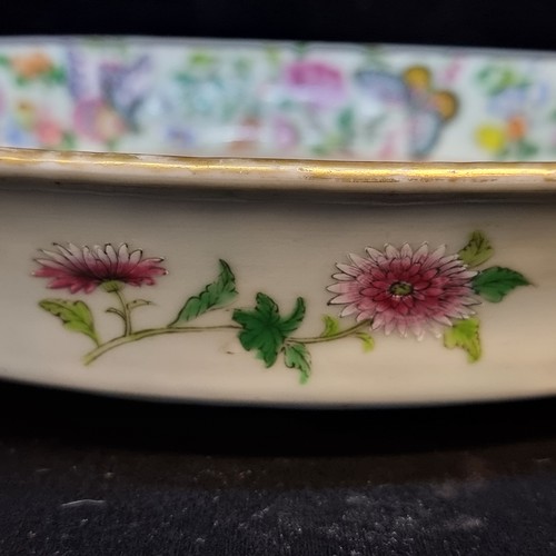 555 - A large stunning hand painted Chinese ceramic dish featuring flowers and butterflies in soft shades ... 