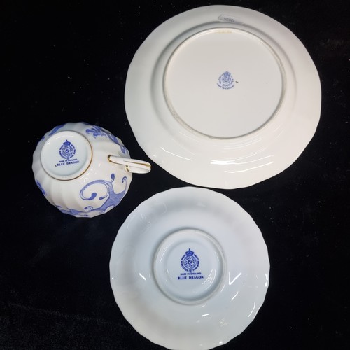 590 - A lovely three piece Royal Worcester Fine Bone China cup, saucer and side plate in the 