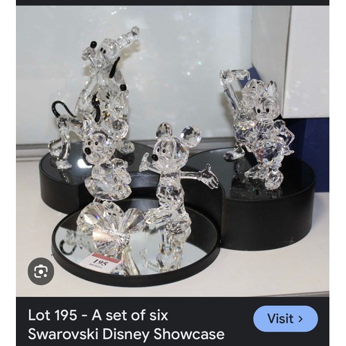 710 - A brilliant Swarovski Crystal Three Piece display stand for the Disney Showcase series. Shaped in th... 