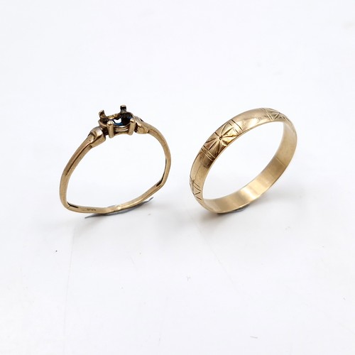 989 - Two ladies rings including a very pretty 9 carat gold wedding example with delicate engravings hallm... 