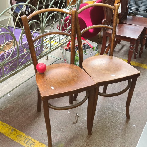 337 - A pair of early 20th century bentwood bistro dining chairs. info john repair