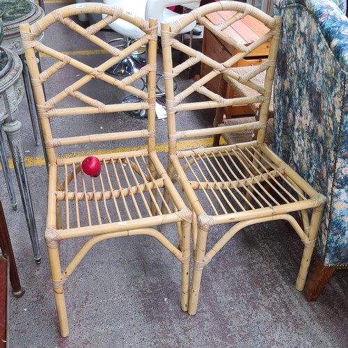 341 - A pair of well constructed solid bamboo conservatory patio chairs.