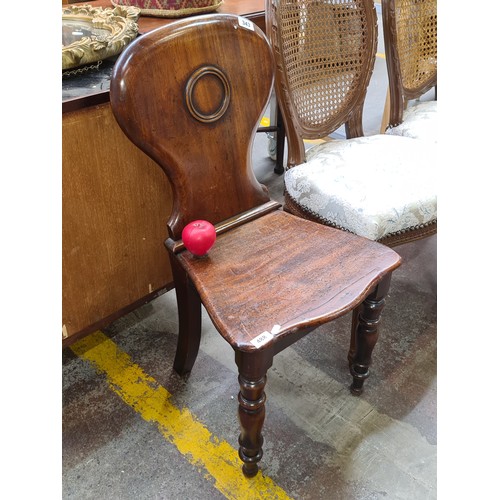 343 - A Victorian mahogany hall chair with turned legs, balloon back. Lovely colour and grain on this one.