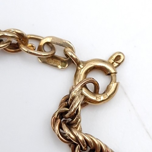 6 - Star Lot : A nice example of a rope twist necklace in nine carat gold. Length of necklace - 48 cms. ... 