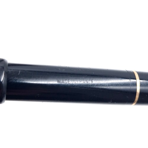 35 - A vintage Stylomine 303 black pen set with 18 carat nib. Item appears to be unused.