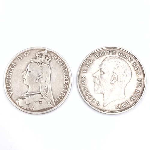 420 - Two silver crowns. A Queen Victoria old head crown dated 1890. Weight - 27.55 grams. Together with a... 