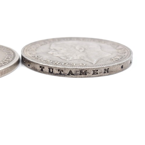 420 - Two silver crowns. A Queen Victoria old head crown dated 1890. Weight - 27.55 grams. Together with a... 