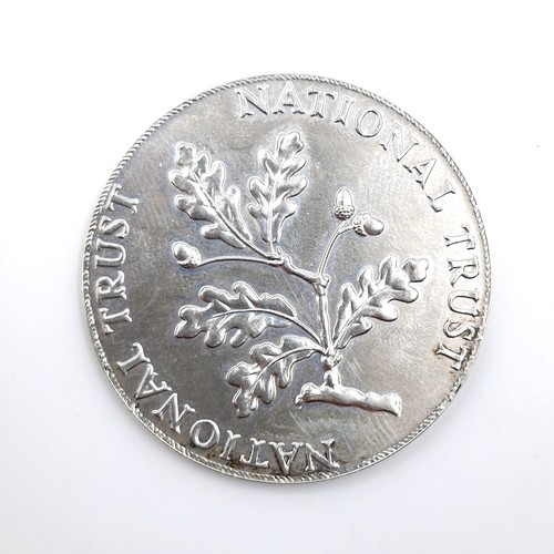 436 - A hallmarked London silver national trust medallion issued by The Royal Mint. Diameter - 4 cms. Weig... 