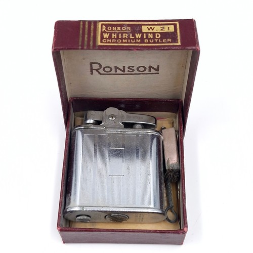 490 - A vintage Ronson whirlwind lighter together with maintenance items i.e. cleaning brushes. Comes in o... 