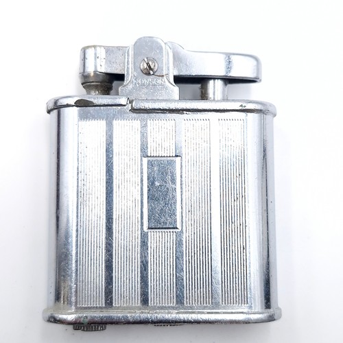 490 - A vintage Ronson whirlwind lighter together with maintenance items i.e. cleaning brushes. Comes in o... 